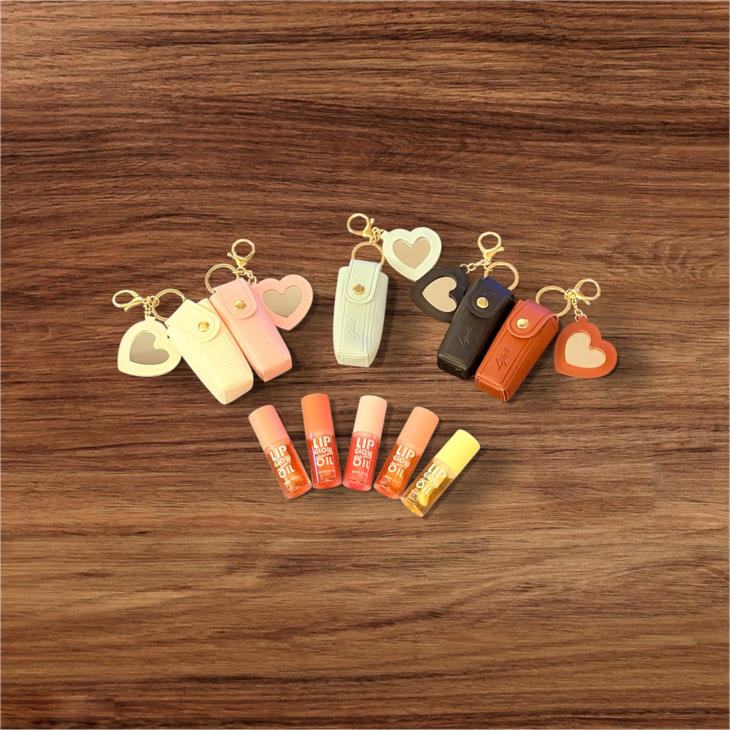 Lip oil with convenient on the go holder, with added mirror